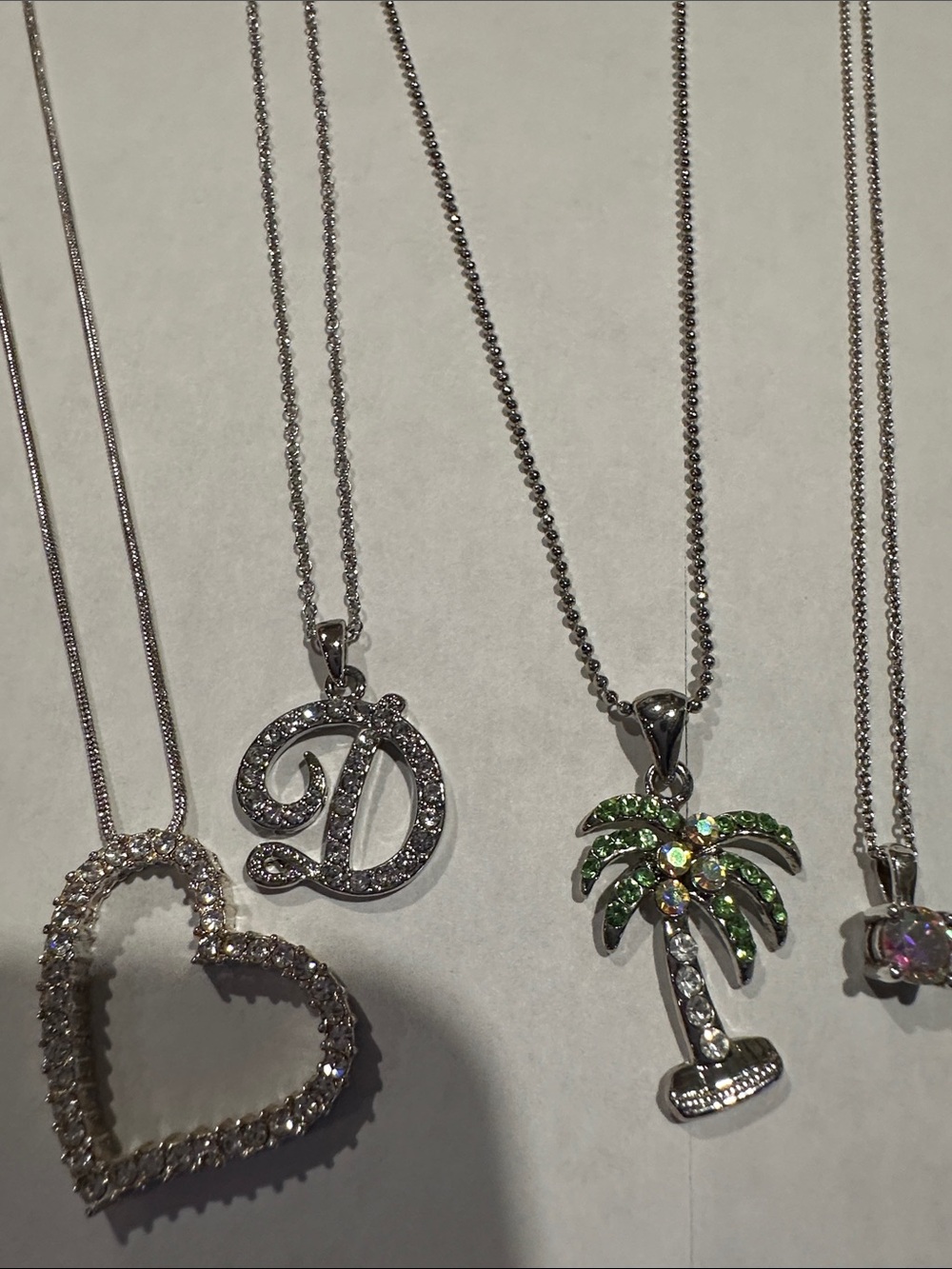 Silver toned crystal Pendant Necklaces, set of 4